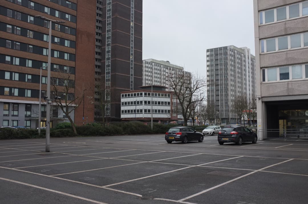 Photo of a mostly empty car park